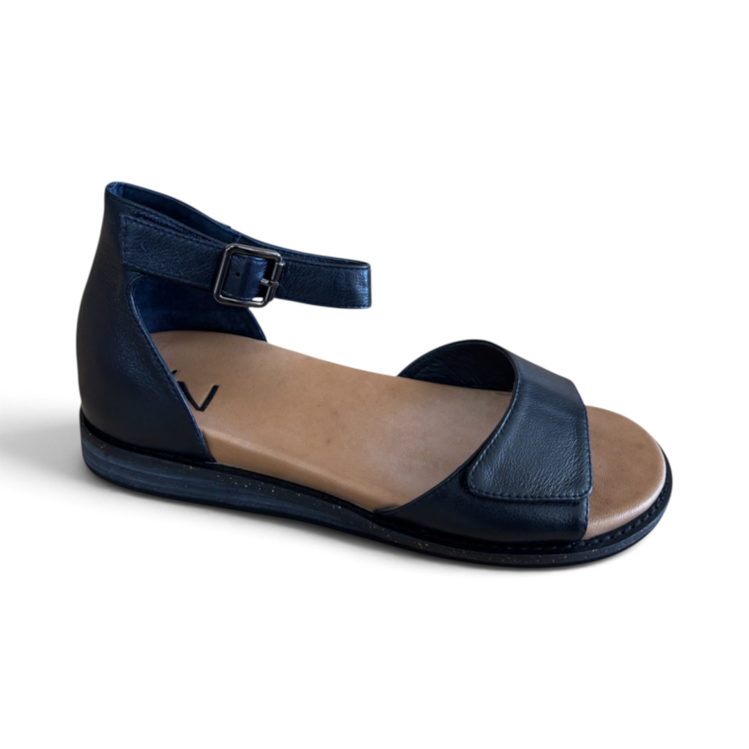 The Happy Shoe Shop Via Nova TJ Jamie black leather flat sandals with an ankle strap and buckle closure