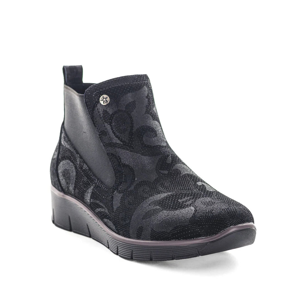 Black patterned ankle boot on a white background