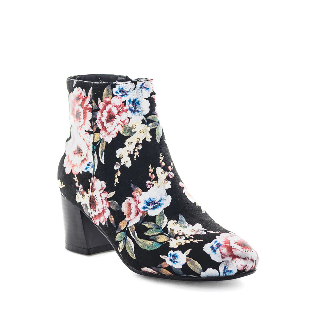 Black ankle boot with colorful floral pattern on a white background