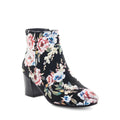 Black ankle boot with colorful floral pattern on a white background