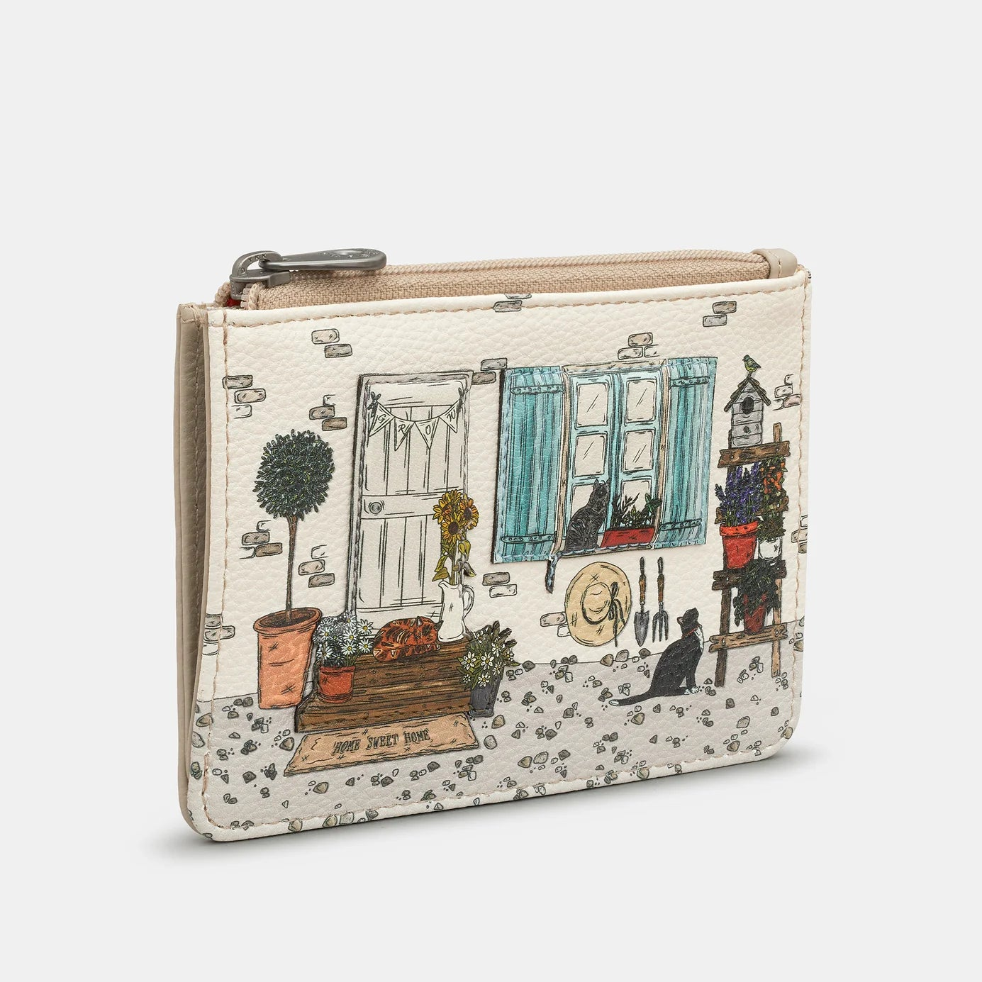 Small pouch with a printed design of a window and outdoor scene on a white background