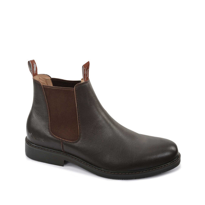 Brown leather Chelsea boot on a white background