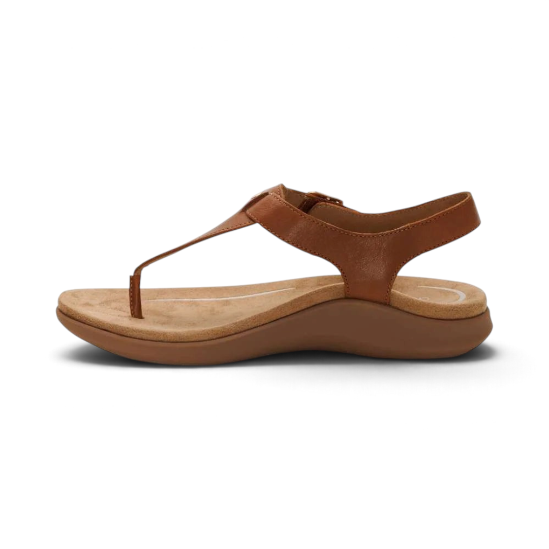 The Happy Shoe Shop Aetrex Tracey brown leather thong sandal with an adjustable strap and cushioned footbed.