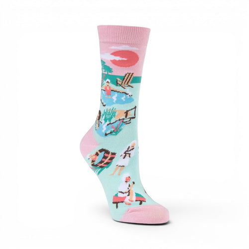 The Happy Shoe Shop Bamboozld Hot Springs socks: light blue with pink cuff, toe, and heel. Features spa and pool scenes.