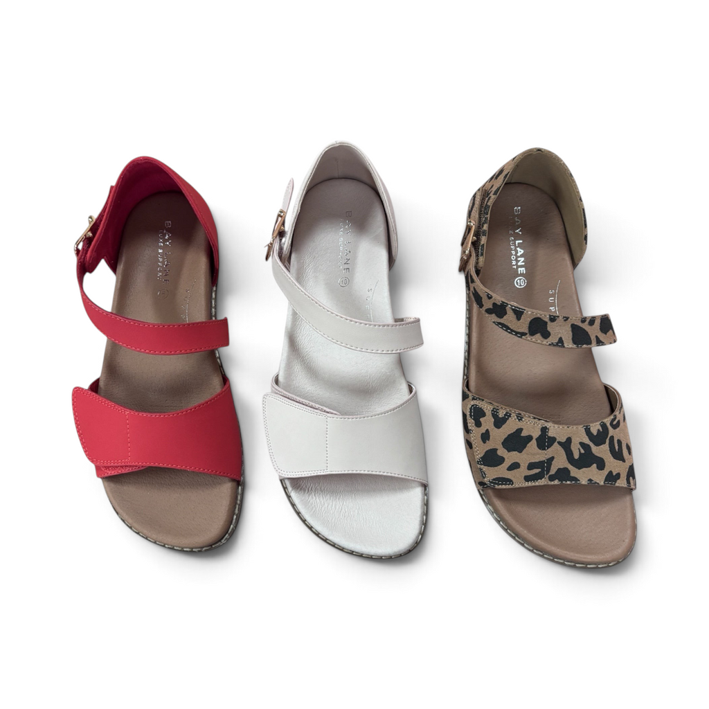 The Happy Shoe Shop Bay Lane Moonta sandals in red, white, and leopard print with adjustable Velcro straps.