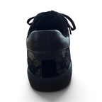The Happy Shoe Shop Via Nova Flirt black lace sneaker, back view showing textured floral lace and sleek heel panel.