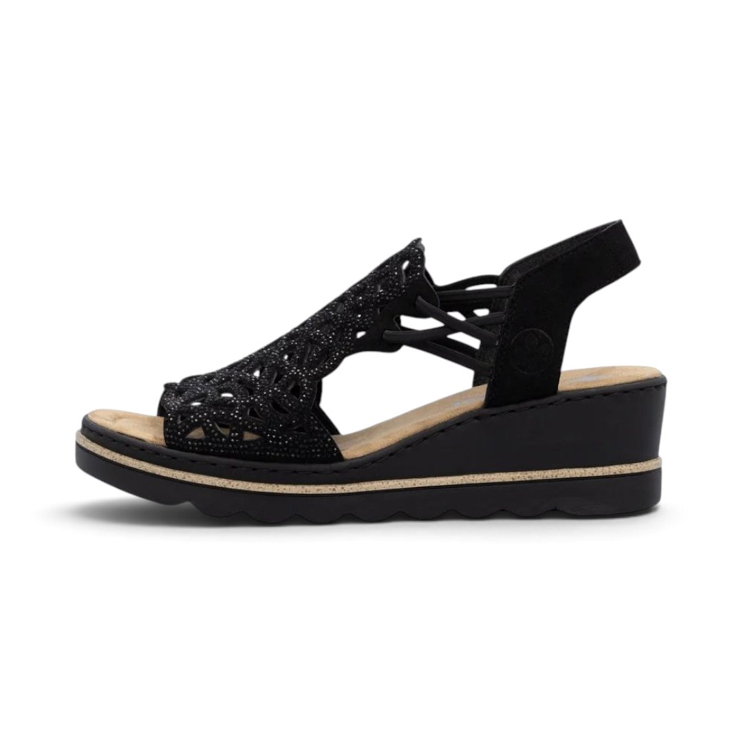 The Happy Shoe Shop Rieker black wedge sandal with intricate cut-out textile upper and cushioned insole