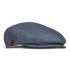 The Happy Shoe Shop Thomas Cook Evan driver cap in blue linen with a logo embossed trim and tailored fit.