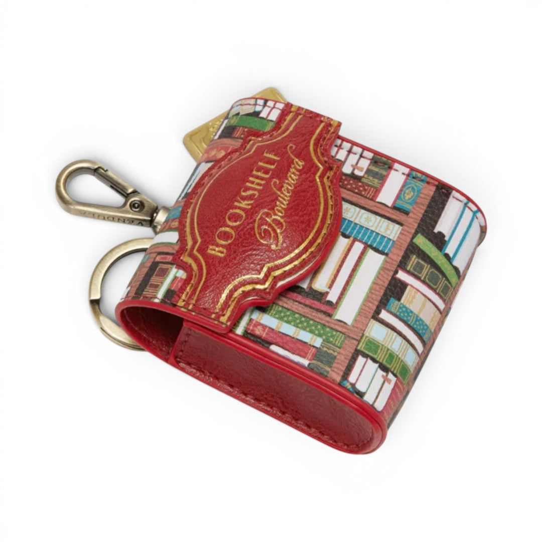 The Happy Shoe Shop Bookshelf Boulevard Pods Case is made of printed vegan leather with a bookshelf design and red trim. Features a magnetic closure and keychain.