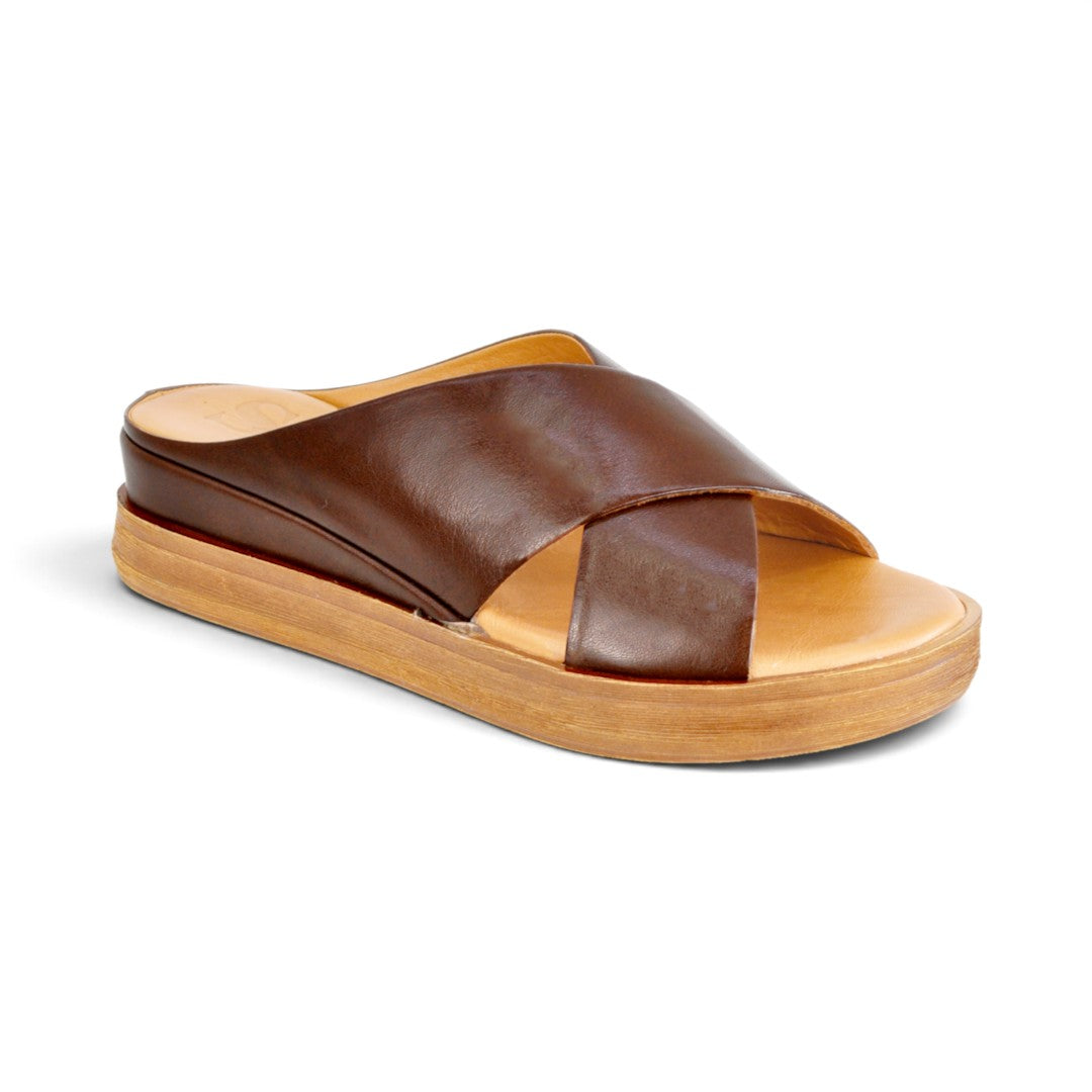 The Happy Shoe Shop Sala Posie brown leather slides featuring a comfortable low wedge heel and V-shaped upper.