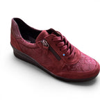 The Happy Shoe Shop ACO Comfort Aberdeen burgundy sneaker with floral texture, side zipper, and lace-up closure.