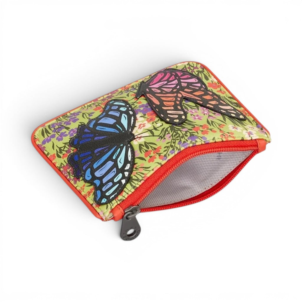 The Happy Shoe Shop Yoshi leather coin purse featuring colourful butterfly appliqués and a floral print with zip closure.