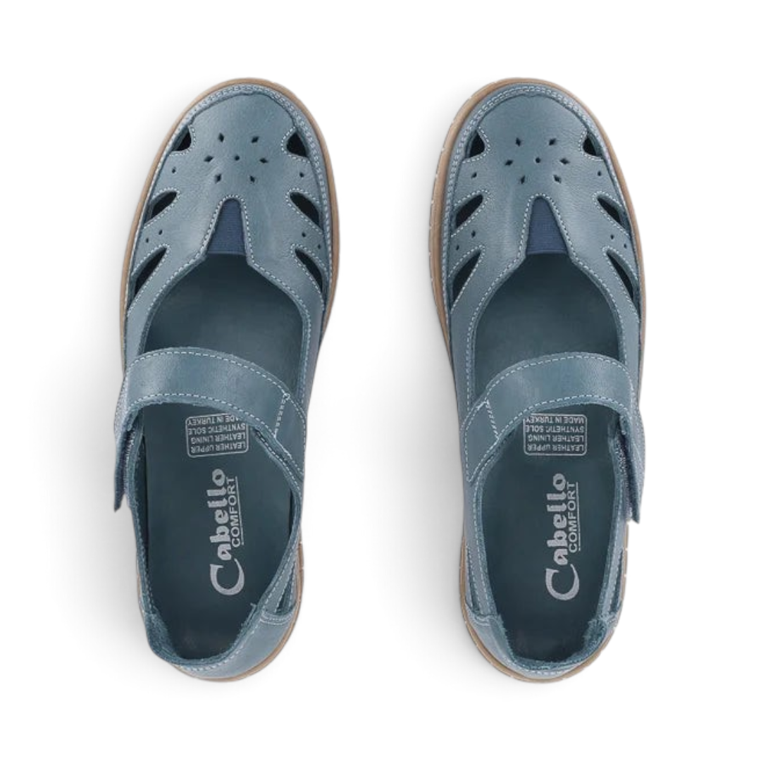 The Happy Shoe Shop Cabello Rise blue leather Mary Jane shoes with cut-out details and adjustable Velcro straps.