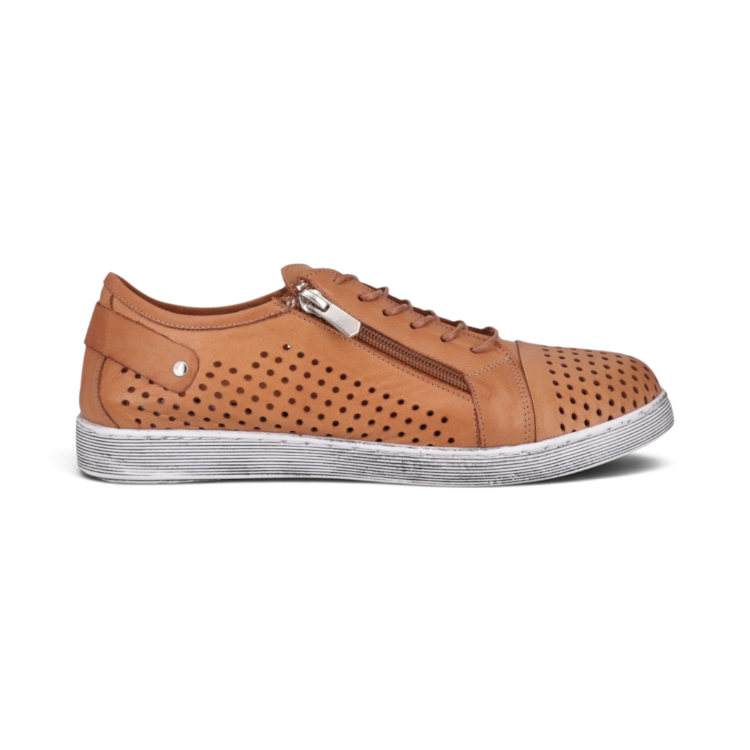 The Happy Shoe Shop Cabello EG17 tan leather sneaker with perforated detailing, side zip, and white textured sole.
