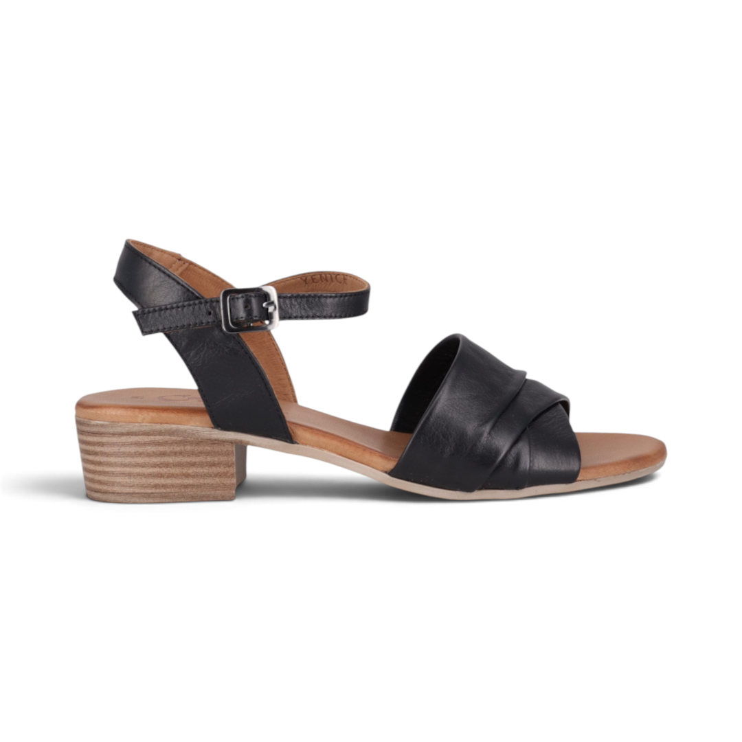 The Happy Shoe Shop Cabello Yenice black leather low block heel sandals with an adjustable ankle strap.