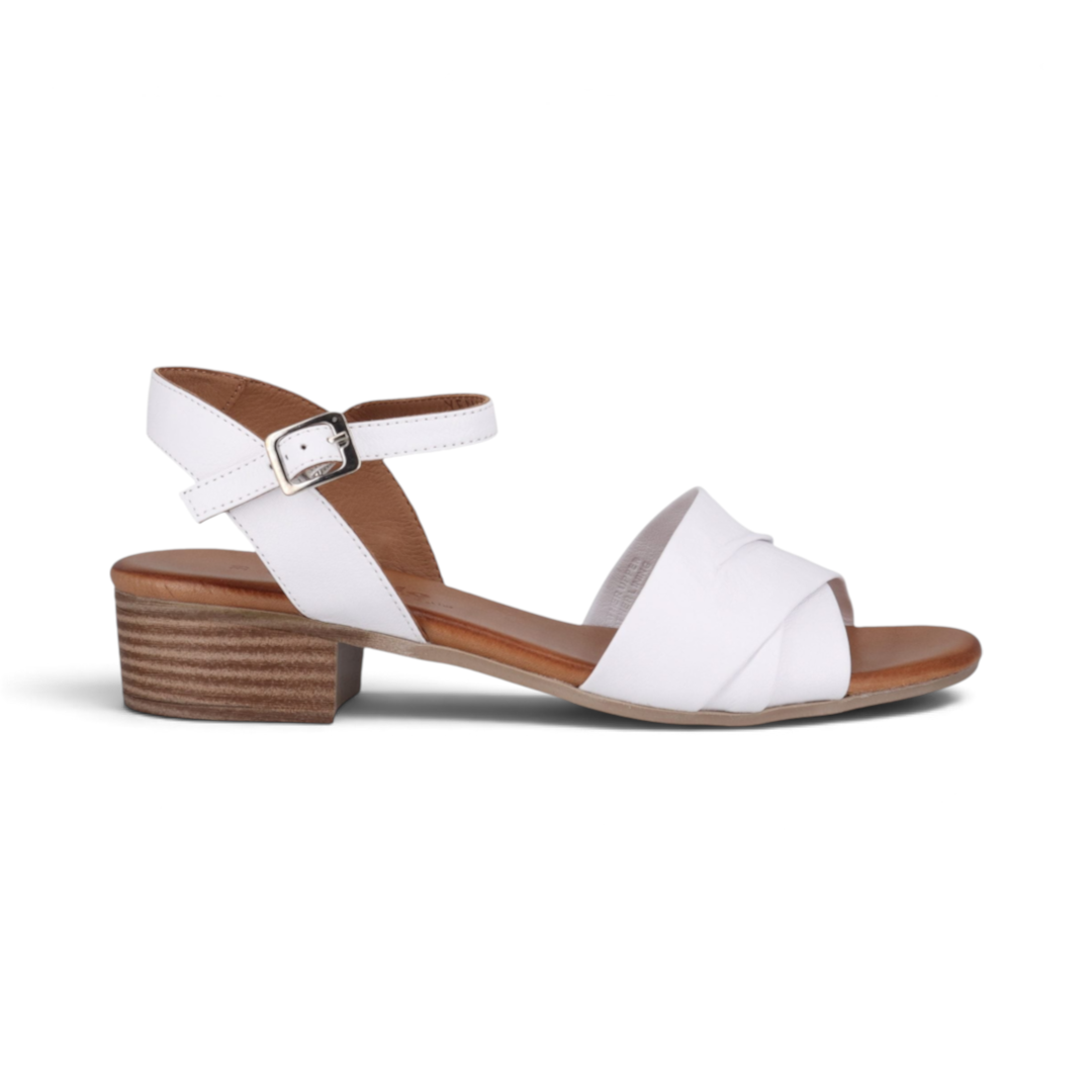 The Happy Shoe Shop Cabello Yenice white leather low block heel sandals with an adjustable ankle strap.