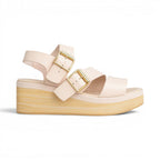 The Happy Shoe Shop Le Sansa cameo pink leather platform wedge sandal with gold buckle straps and wood-look sole.