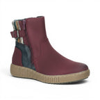 The Happy Shoe Shop CC Resorts Garrett Boot in burgundy faux leather with dual zips, buckle detail, and a patterned knit cuff.