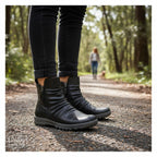 The Happy Shoe Shop CC Resorts Greco Boot: black vegan leather ankle boot with ruched detailing and dual zippers.