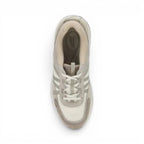 The Happy Shoe Shop Dansko Poppy beige leather and mesh walking sneaker, top-down view showing lace-up design.
