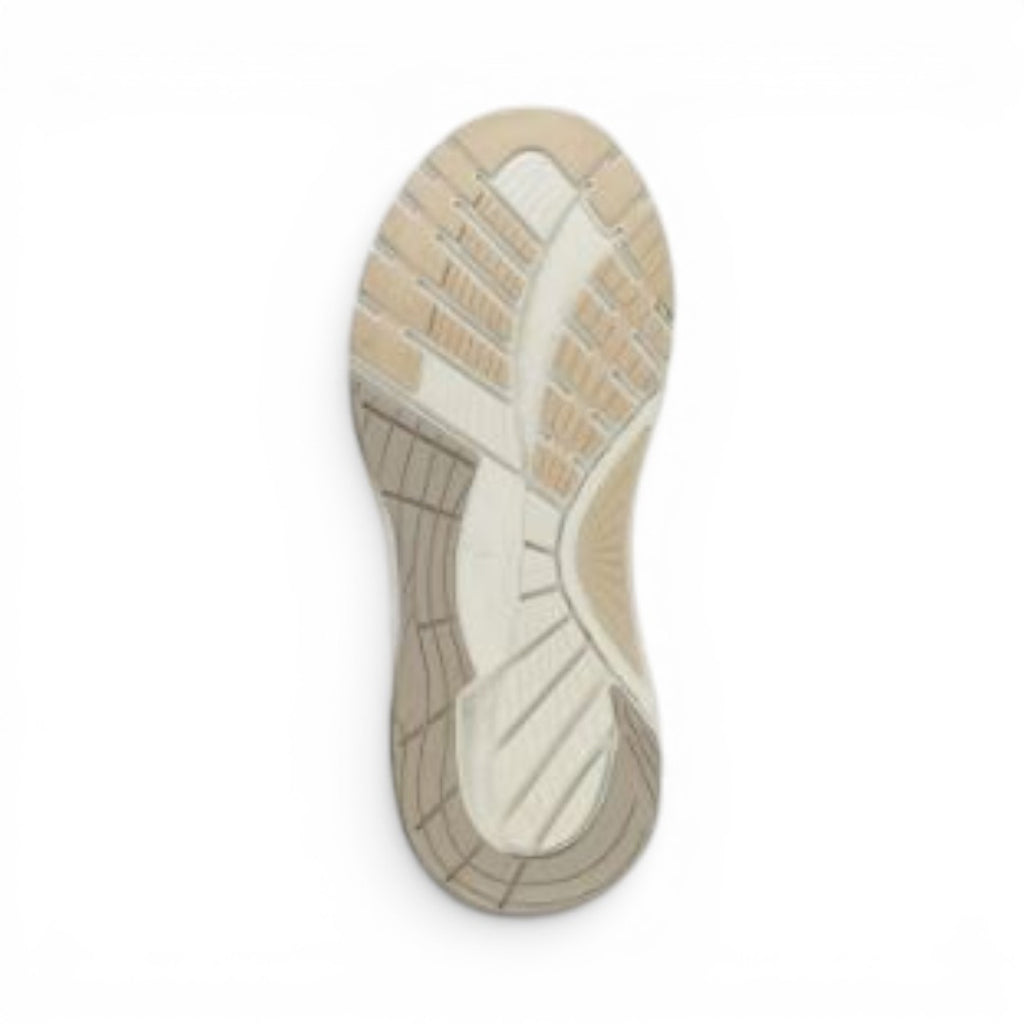 The Happy Shoe Shop Dansko Poppy sneaker rubber outsole with beige and white tread pattern for traction.