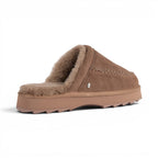 The Happy Shoe Shop Emu Sharky Slide in brown suede with plush Australian sheepskin lining and a serrated rubber sole.