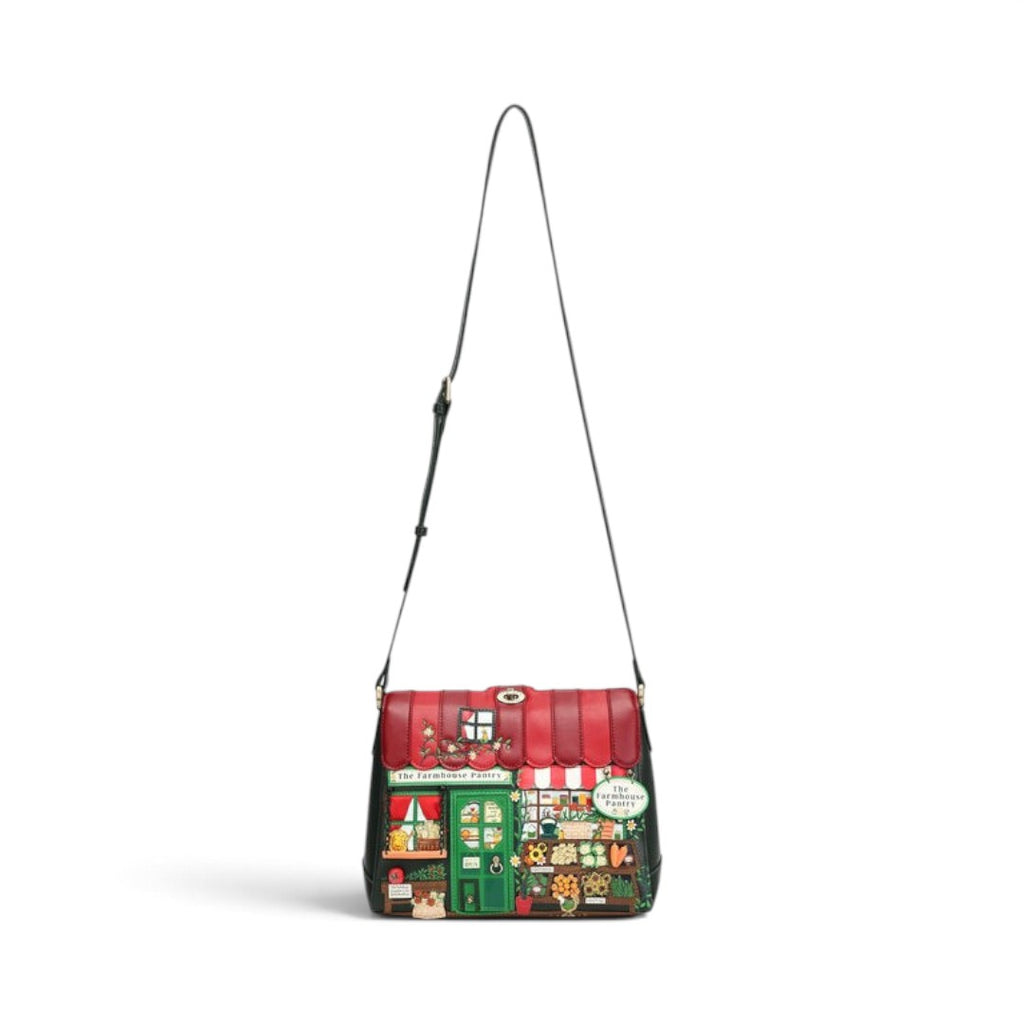 The Happy Shoe Shop Vendula London Farmhouse Pantry Alice bag with red and green vegan leather shopfront design.