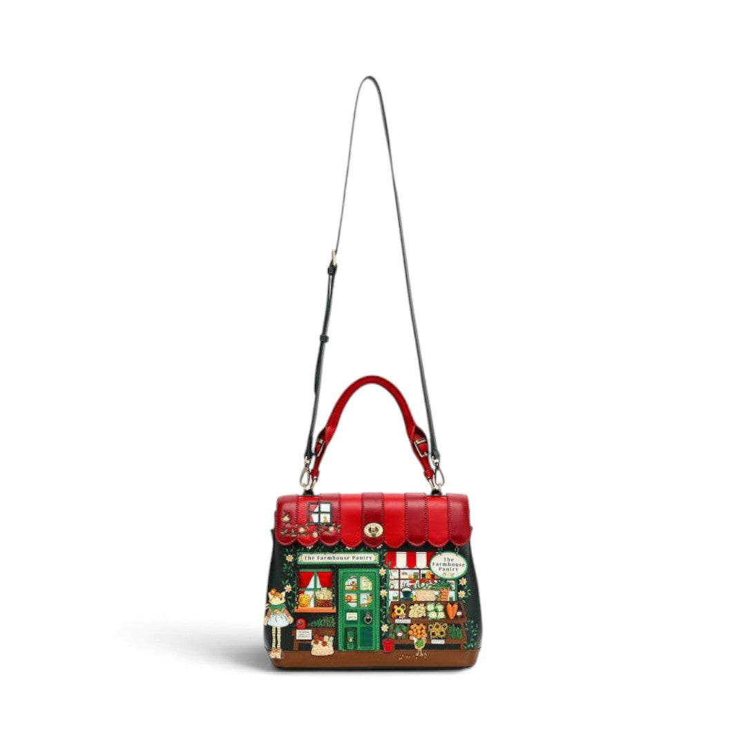 The Happy Shoe Shop Vendula London Farmhouse Pantry Grace Bag in red and green vegan leather with shopfront design.