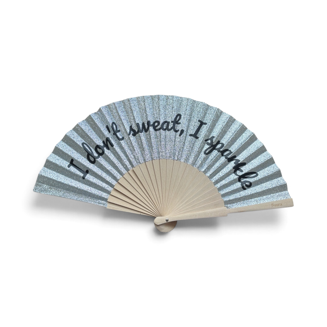The Happy Shoe Shop Fisura hand fan with silver glitter stripes and the text I don't sweat, I sparkle on bamboo