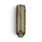 The Happy Shoe Shop Vendula London flower shop square wallet in amber, showing the side view with green zip closure.