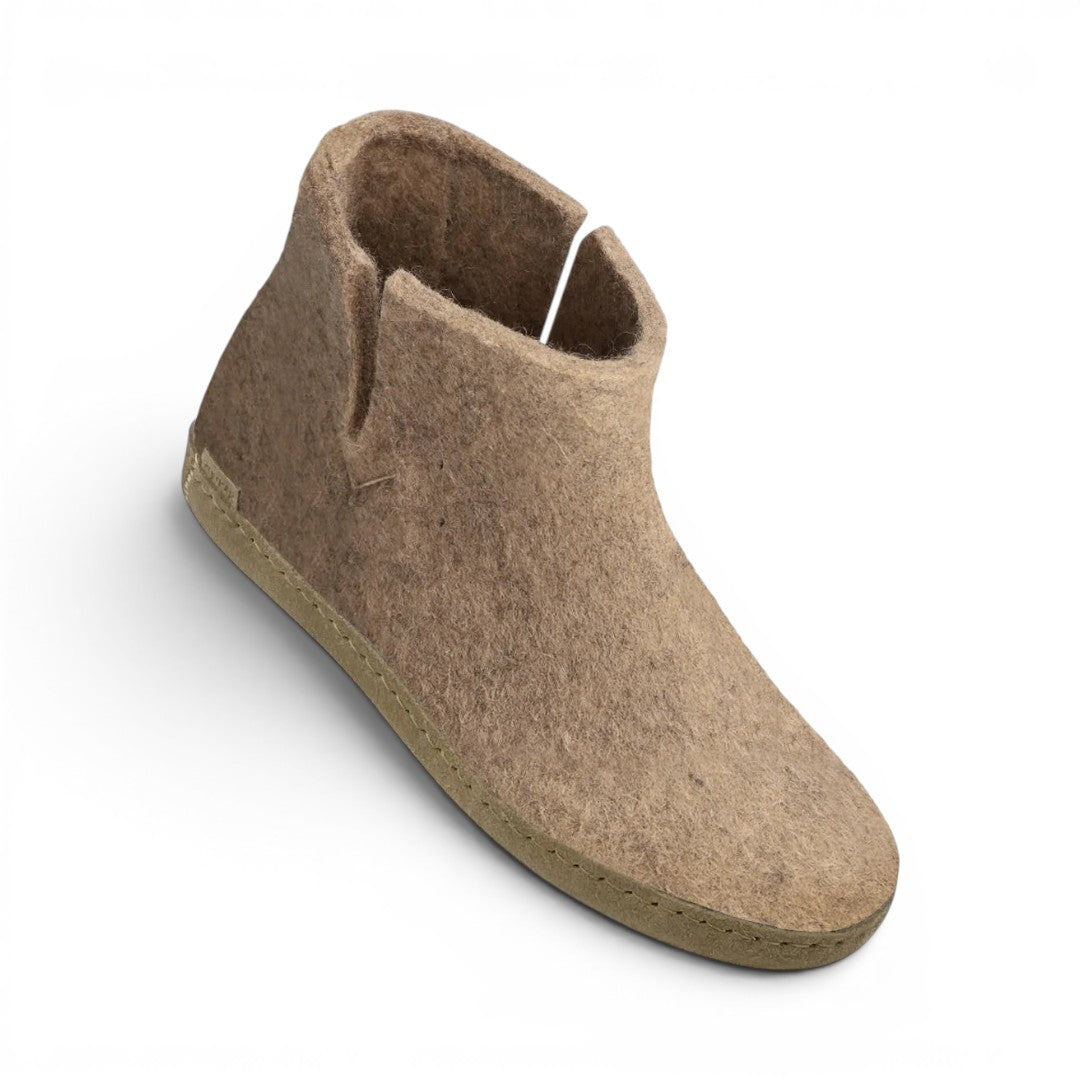 The Happy Shoe Shop Glerups The Boot, a natural wool felt boot in taupe with a rubber sole. Features a split ankle opening.