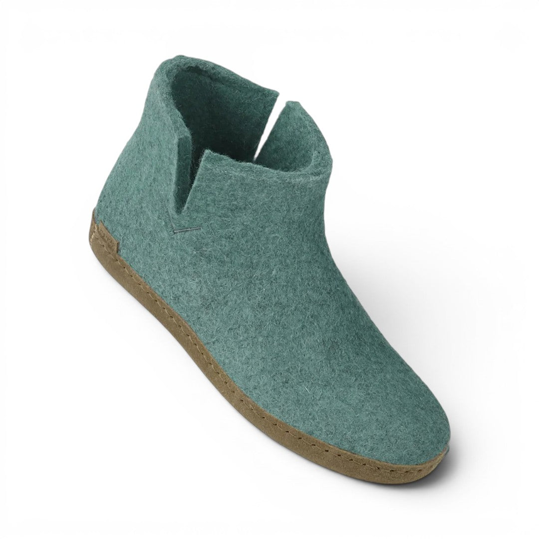 The Happy Shoe Shop Glerups The Boot, teal wool felt slipper boot with natural leather sole and V-cut opening.