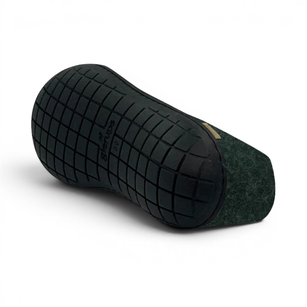 The Happy Shoe Shop Glerups The Shoe, dark green wool slipper with a black rubber sole and a textured tread.