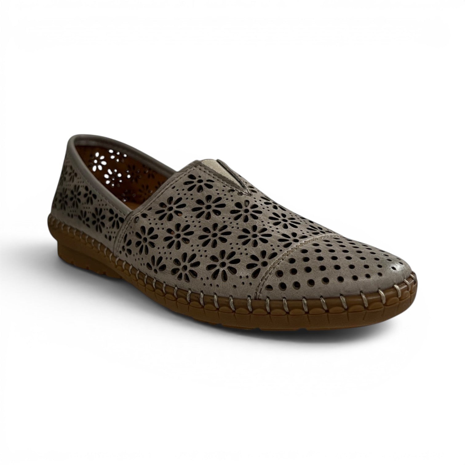 The Happy Shoe Shop Cabello Kylie grey leather slip-on shoe with floral laser-cut perforations and rubber sole.