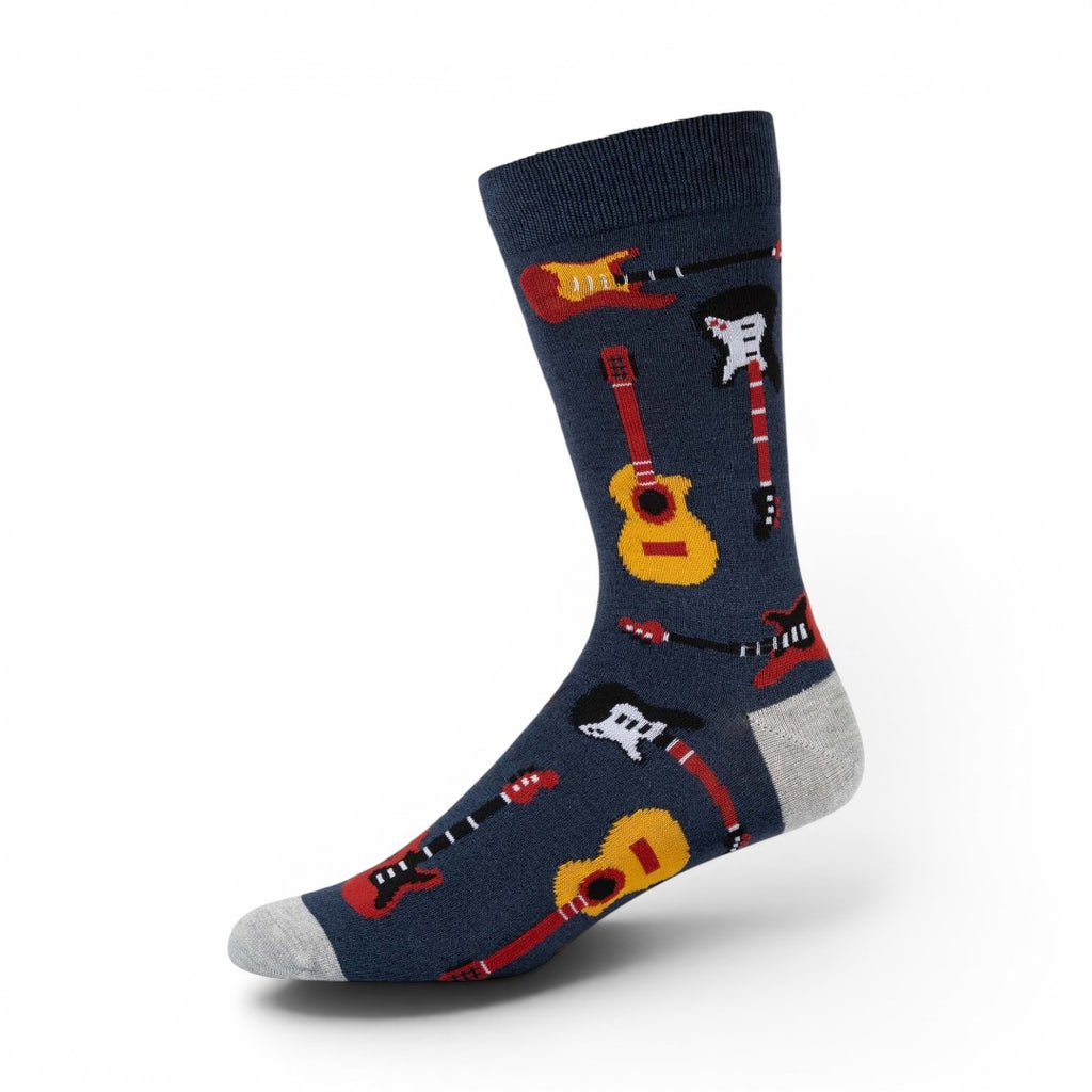 The Happy Shoe Shop Men's navy blue bamboo socks with a pattern of various guitars in red, yellow, and white.