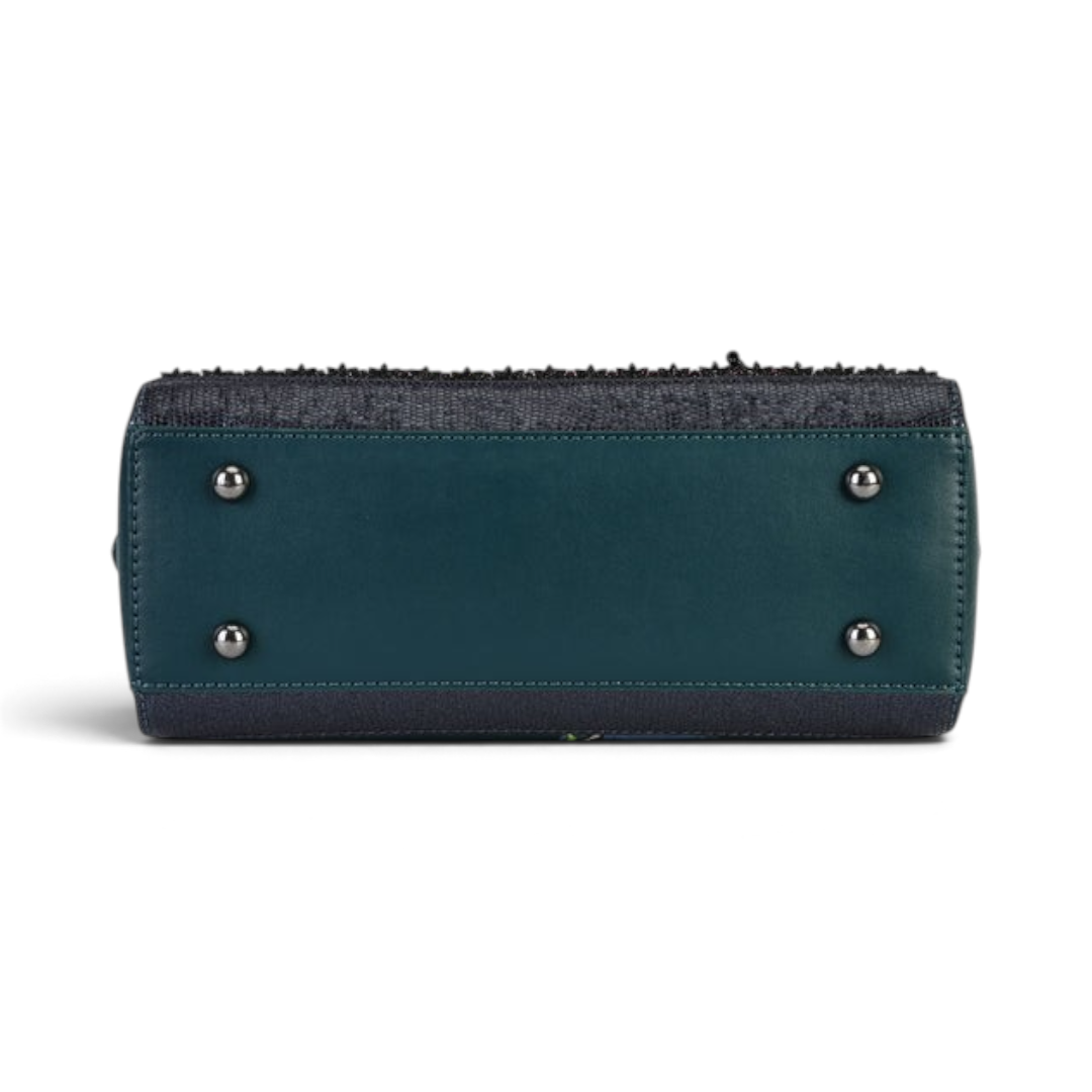 The Happy Shoe Shop Vendula Haunted Theatre bowler bag base showing dark teal vegan leather and protective metal feet.