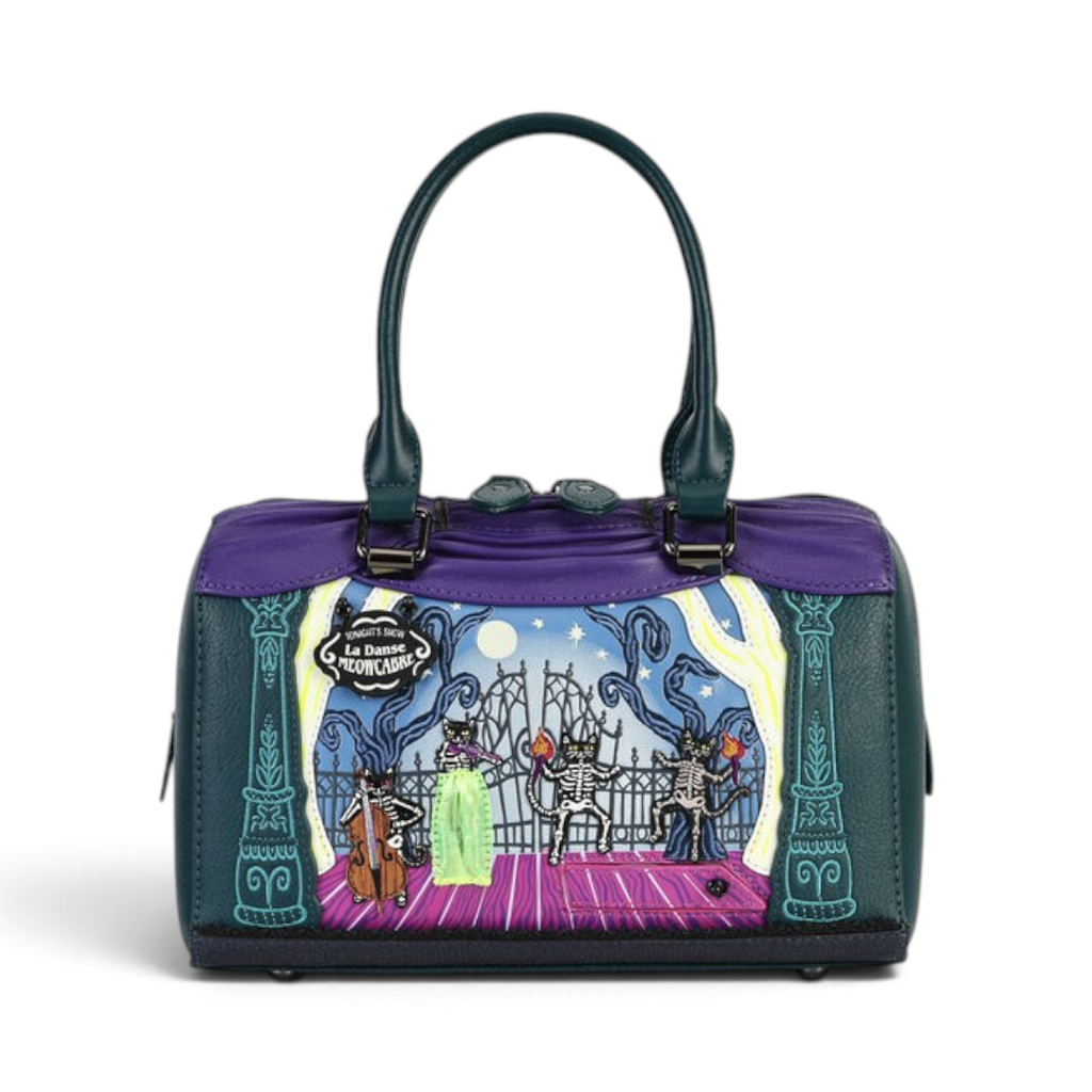 The Happy Shoe Shop Vendula London Haunted Theatre bowler bag in purple and green vegan leather with skeleton cat art.