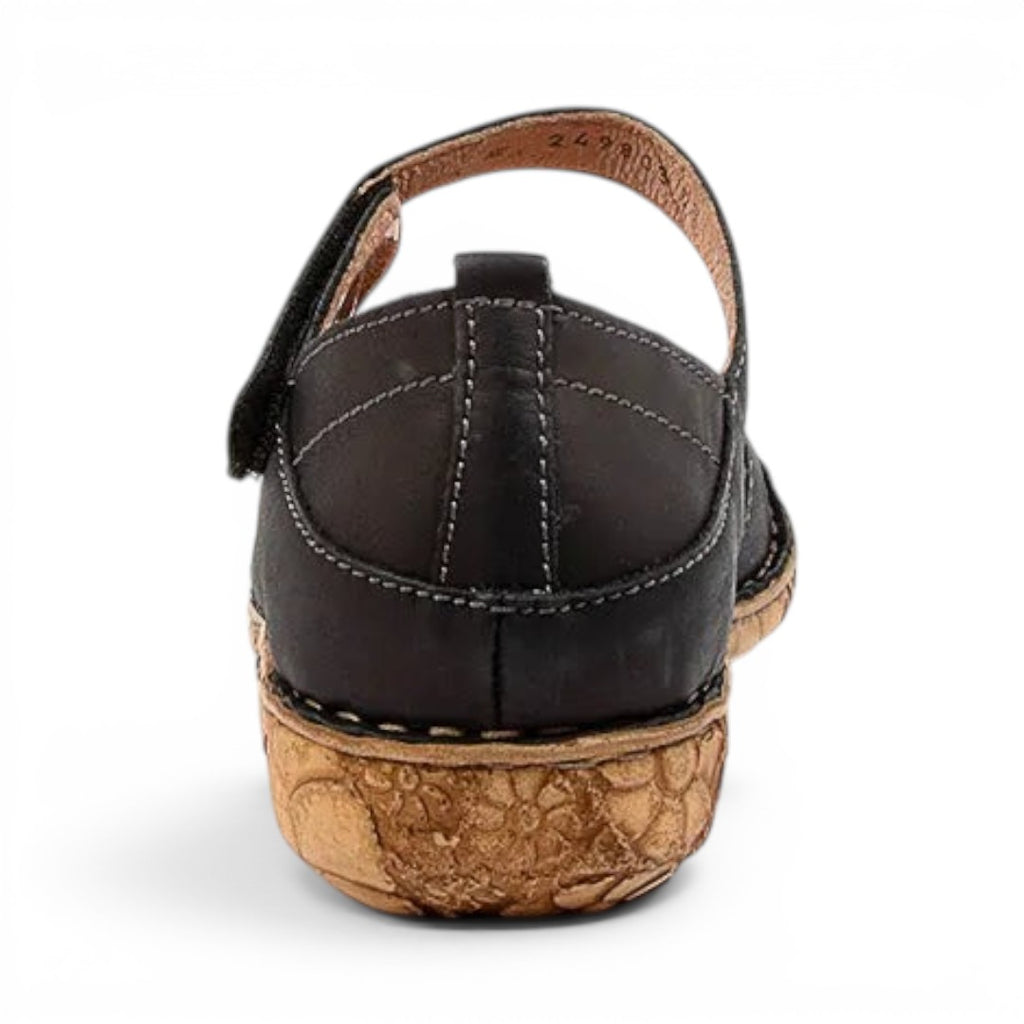 The Happy Shoe Shop Josef Seibel Rosalie 42 black leather closed-toe sandal with a floral engraved cork sole, back view.