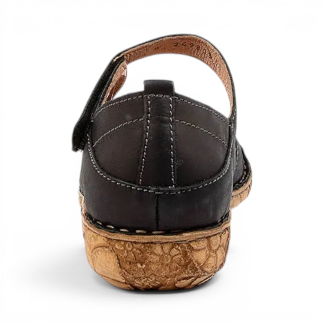 The Happy Shoe Shop Josef Seibel Rosalie 42 black leather closed-toe sandal with a floral engraved cork sole, back view.