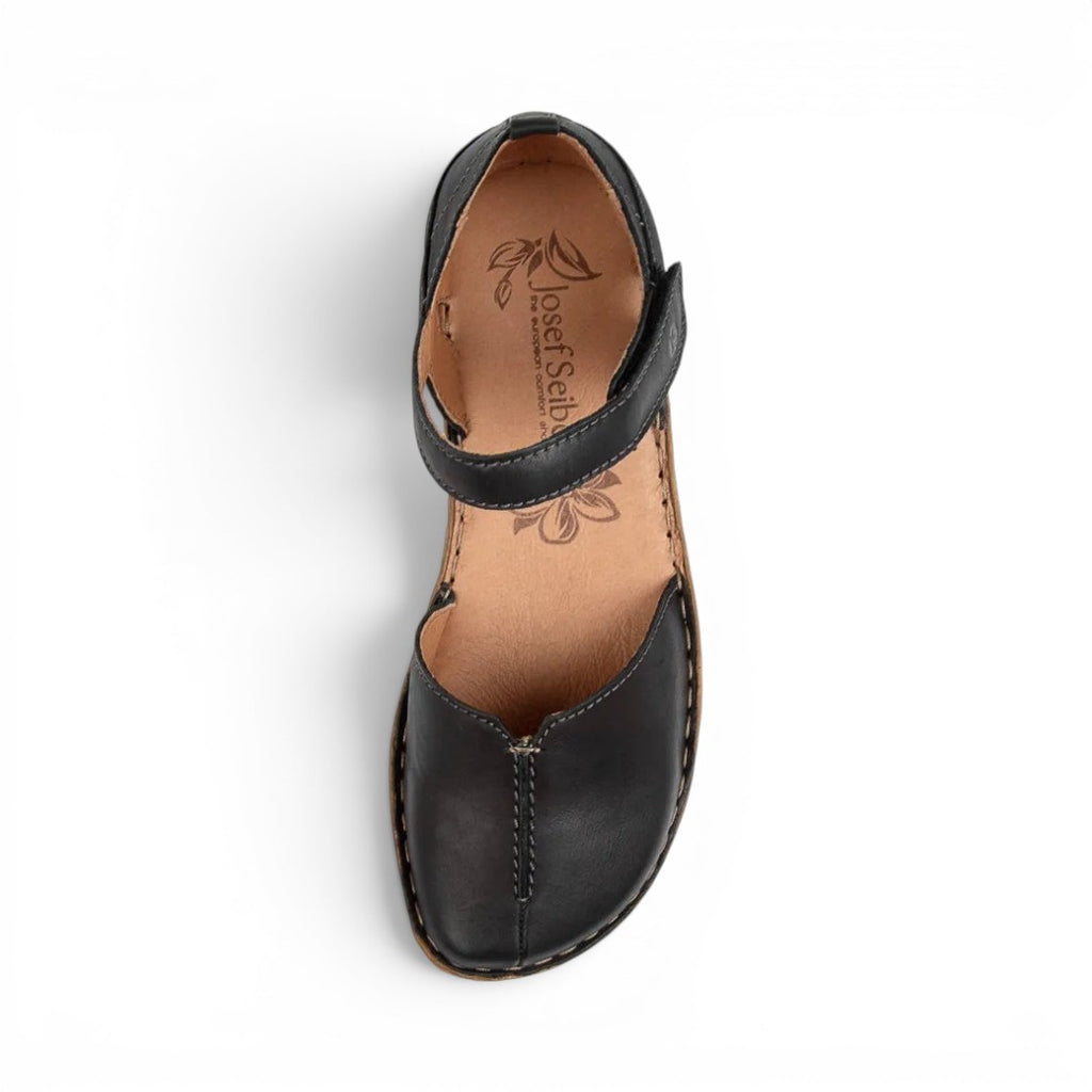 The Happy Shoe Shop Josef Seibel Rosalie 42 black leather closed-toe sandal with T-strap and floral footbed detail.