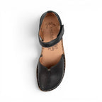 The Happy Shoe Shop Josef Seibel Rosalie 42 black leather closed-toe sandal with T-strap and floral footbed detail.