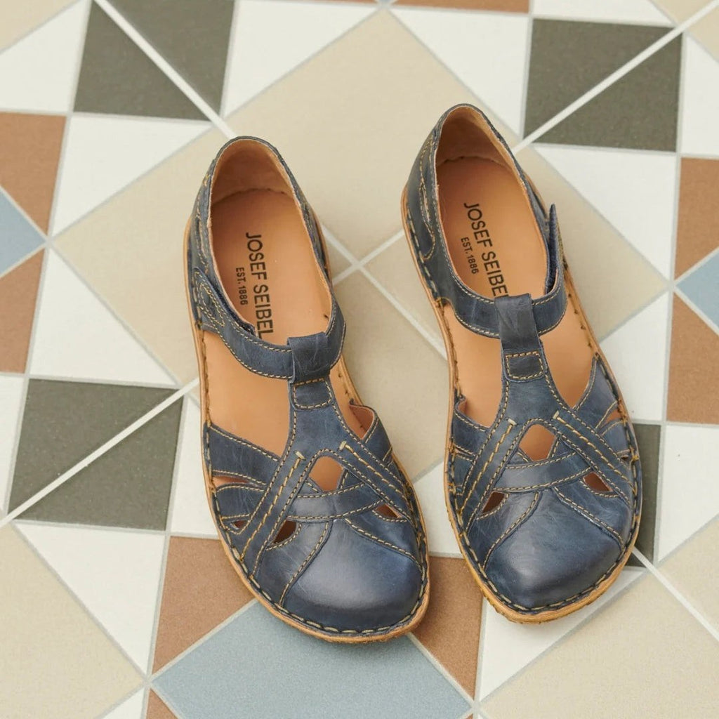 The Happy Shoe Shop Josef Seibel Rosalie 29 blue leather closed-toe sandals with T-strap and contrast stitching.