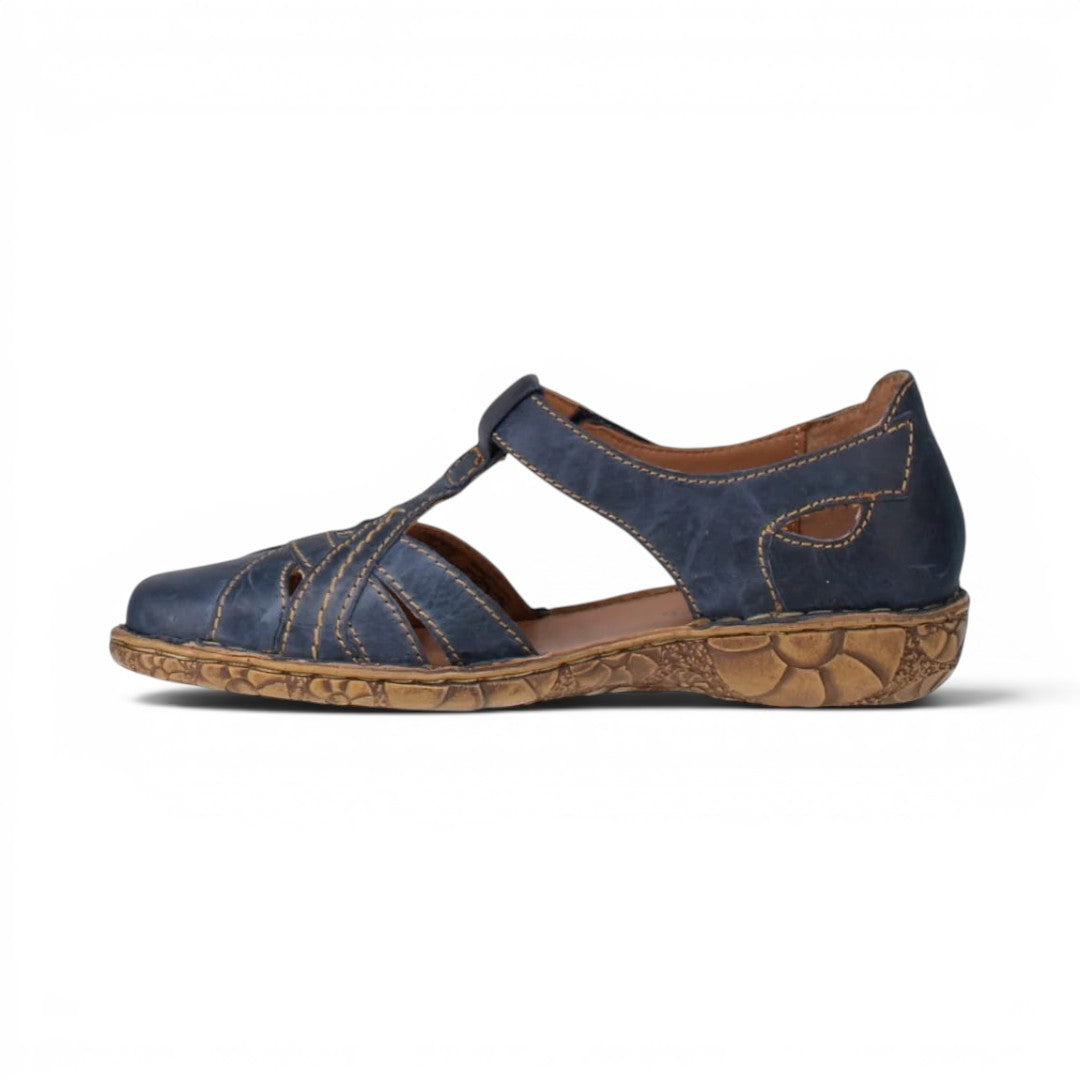 The Happy Shoe Shop Josef Seibel Rosalie 29 blue leather closed-toe T-strap sandal with cork footbed and stitching.