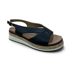 The Happy Shoe Shop Bay Lane Lacey black platform sandals with a criss-cross strap, slingback, and cork-look sole.