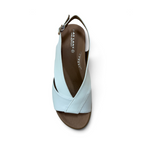 The Happy Shoe Shop Bay Lane Lacey white platform sandals with a criss-cross strap design and cushioned footbed.