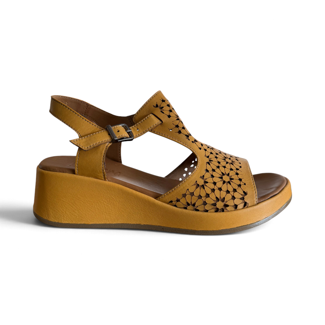 The Happy Shoe Shop Rilassare Petula mustard yellow leather wedge sandals with laser-cut floral pattern