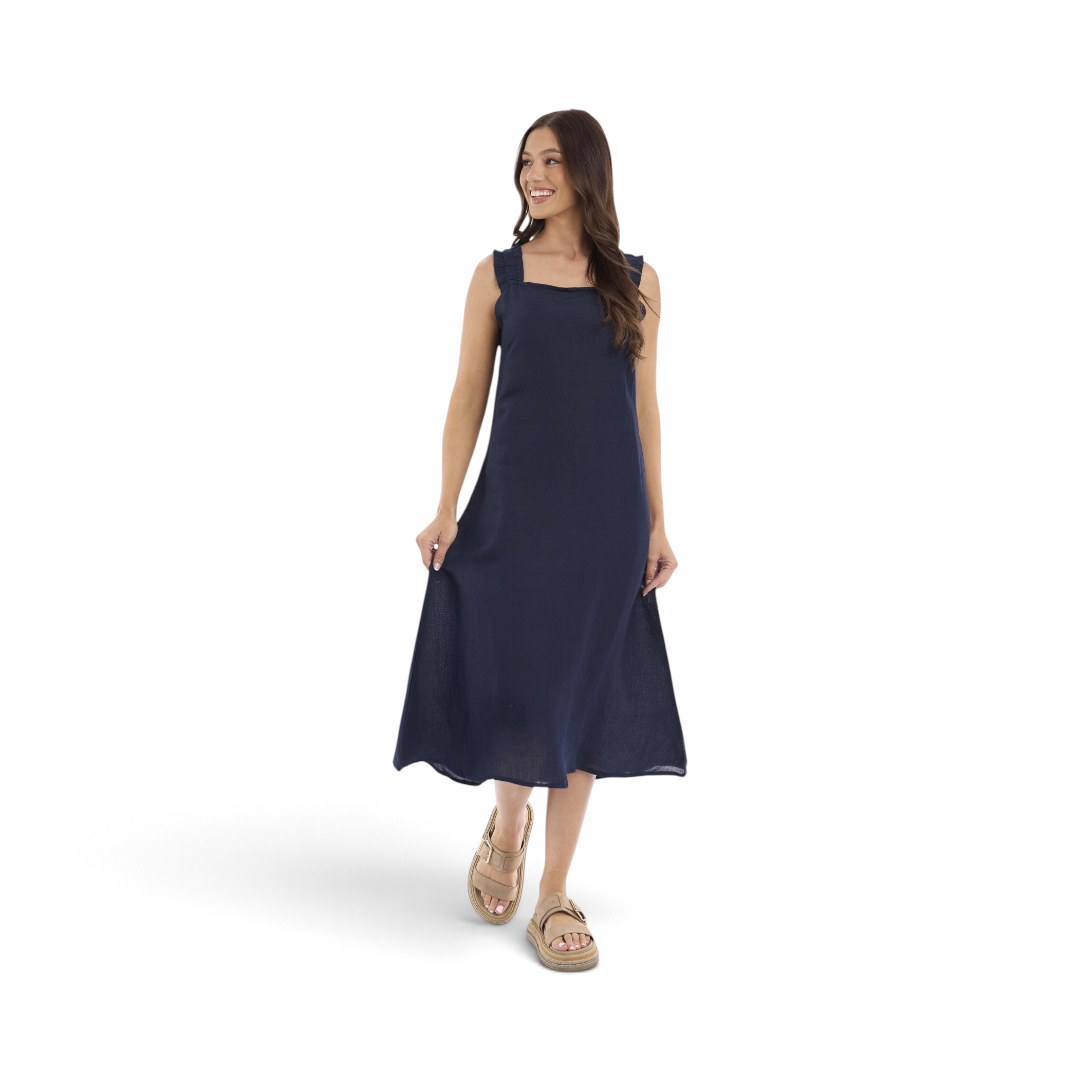 Model wearing The Happy Shoe Shop Orientique Escape navy blue linen blend midi dress with ruffle straps and pockets
