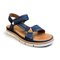 The Happy Shoe Shop Soultbush Harbour navy woven leather-look sandal with tan footbed and white platform sole.