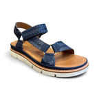 The Happy Shoe Shop Soultbush Harbour navy woven leather-look sandal with tan footbed and white platform sole.