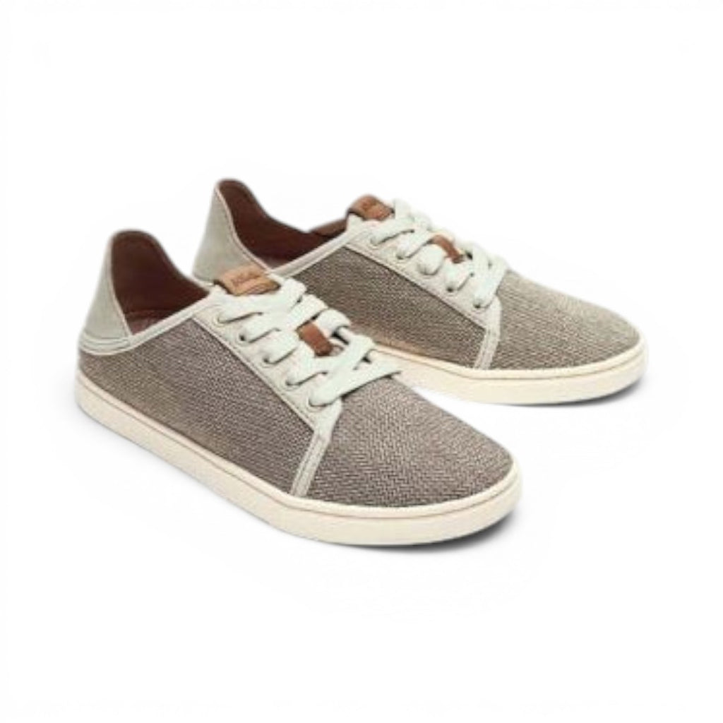 The Happy Shoe Shop Olukai Pehuea Li lace-up sneakers in Tapa Tapa textile with a collapsible heel design.